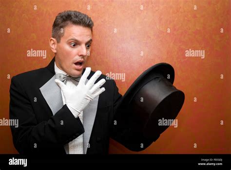 Magician Performing A Magic Trick Stock Photo Alamy