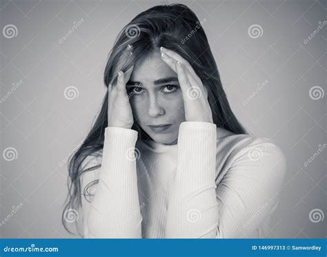 Portrait Of Sad And Intimidated Woman Isolated In White Background