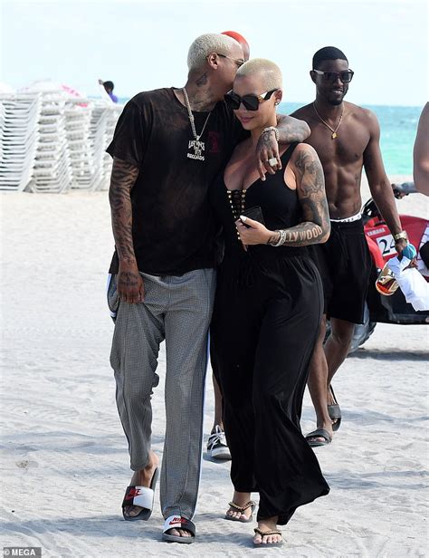 Amber Rose Flaunts Cleavage In Flowing Red Maxi Dress After Getting Cozy With Alexander Edwards