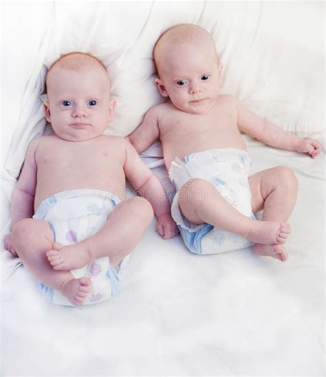 Little Twin Girls Lying Down Stock Photos Free And Royalty Free Stock