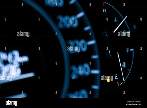 Car Dashboard Shows Low Fuel Warning Light Selective Focus Stock Photo