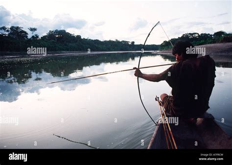 Fishing With Bow And Arrow Stock Photo Alamy
