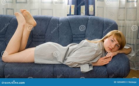 girl on the couch stock image image of tired beauty 1694493
