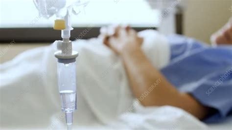 patient with intravenous drip stock video clip k007 1907 science photo library