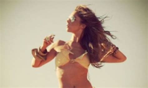 Cheryl Cole Shows Off Her Washboard Abs As She Poses In Skimpy Bikini