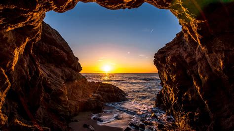 Beach Cave At Sunset
