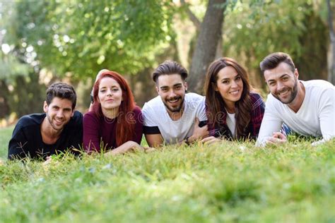 Group Of Young People Together Outdoors In Urban Background Stock Image