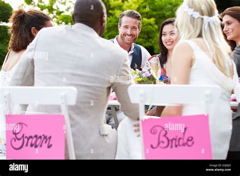 Friends Proposing Champagne Toast At Wedding Stock Photo Alamy
