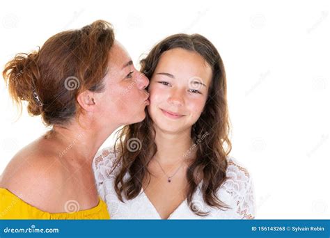 Portrait Closeup Two Caucasian Lovely Women Adult Mother Kissing On Cheek Her Teenage Daughter