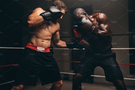 Man Punching Stomach ~ Sports Photos ~ Creative Market