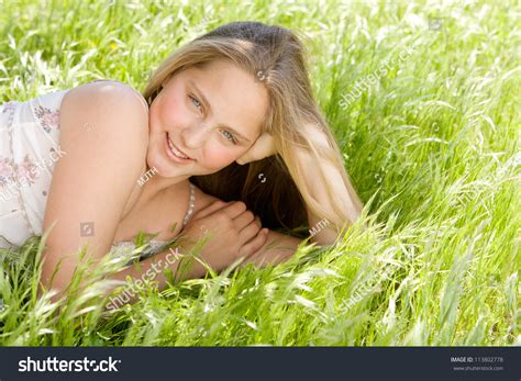 Read on for signs and symptoms of teen depression, and find resources to help your child cope if you think she needs. Beautiful Teenage Girl Laying Down On Stock Photo ...