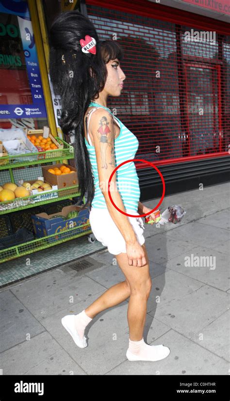 Amy Winehouse Looks A Picture Of Health As She Buys Fresh Cherries And