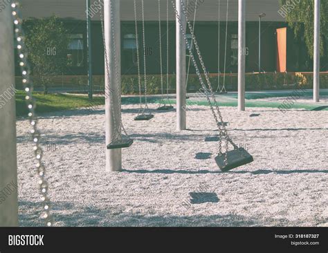 Empty Lonely Swings Image And Photo Free Trial Bigstock