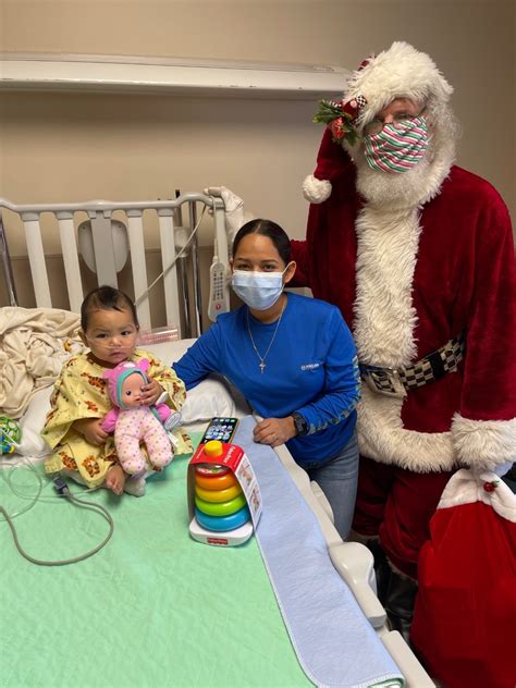 ‘santa Claus Visits Local Hospital Delivers Presents To Children