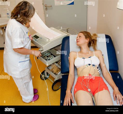 Woman Undergoing An Electrocardiography Ekg Examination Department Of Cardiology Pitie