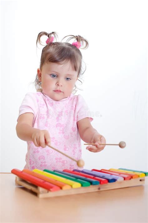 Little Girl Plays On Xylophone Stock Image Image Of Girls Children