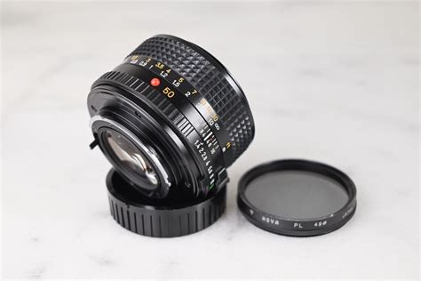 Minolta Md 50mm F14 Fast Prime Lens With Polarizing Filter And Rear