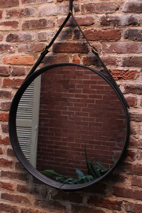 Comes ready to wall mount; Hand Crafted Leather Strap Round Wall Mirror by Tennesee ...