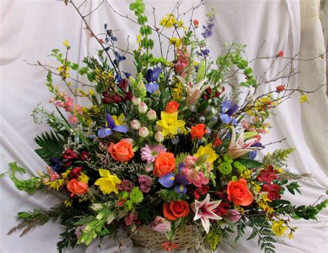 Share condolences with a beautiful funeral vase arrangement today. Funeral basket | Funeral flower arrangements, Fall flower ...