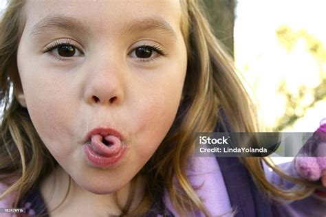 Child Sticking Out Tongue Stock Photo Download Image Now 2 3 Years