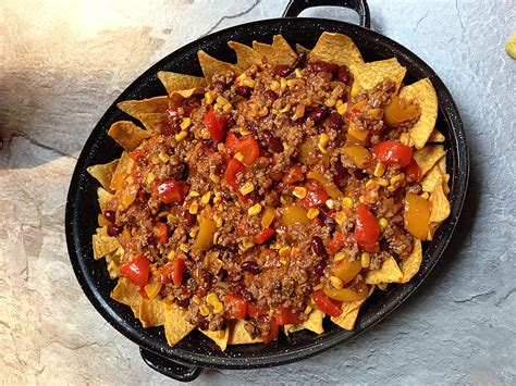Maybe you would like to learn more about one of these? Nachos mit feurigem Hähnchenfleisch (Rezept mit Bild ...