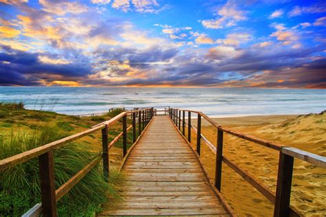 Download Horizon Sunset Ocean Beach Walkway Man Made Path 4k Ultra Hd