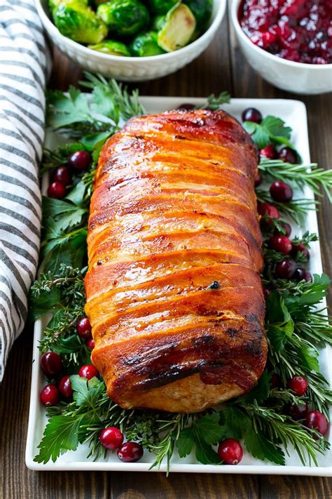 What to look for when choosing a pork tenderloin. A bacon wrapped pork roast is the perfect easy holiday entree. | Meals in 2019 | Bacon wrapped ...