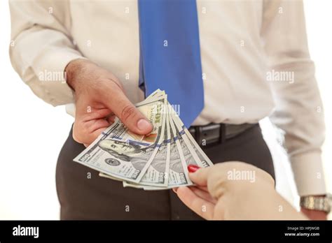 Man Giving Money To Woman Stock Photo Alamy