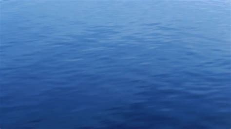 Moving Across Calm Water Surface Stock Footage Videohive