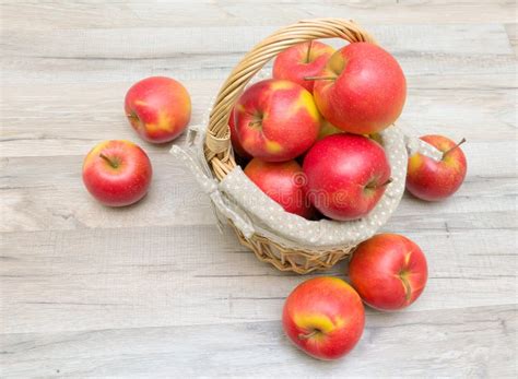 Basket With Ripe Red Apples On A Wooden Table Stock Image Image Of