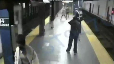 Terrifying Video Shows Man Pushing Woman Onto Nyc Subway Tracks As