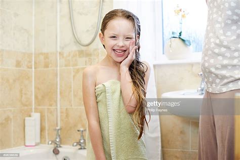 Young Girl Getting Dried After Shower Photo Getty Images