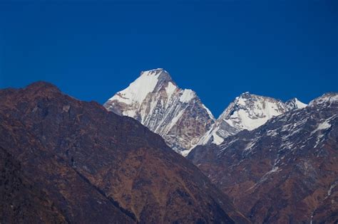 Premium Photo Beautiful Snowy Mountains Trekking In Mt Api Base Camp