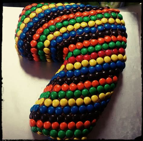 Number 7 Shaped Birthday Cake Decorated With Chocolate Mandms Cupcake