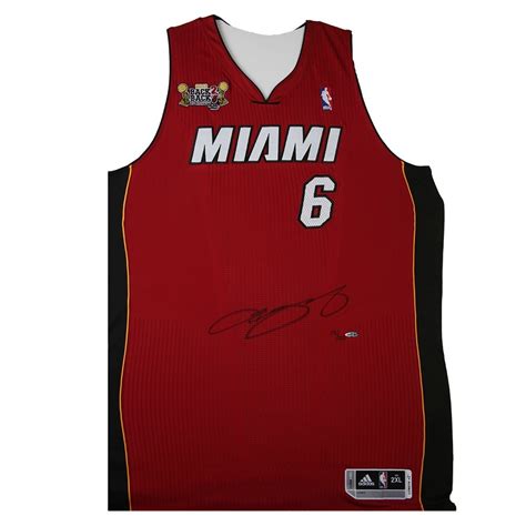Upper deck honor roll has the distinction of being the only lebron james rookie card to incorporate a small relic piece from a jersey worn by james. LeBron James Signed LE Miami Heat Jersey with Back-to-Back NBA Champions Patch (UDA COA ...