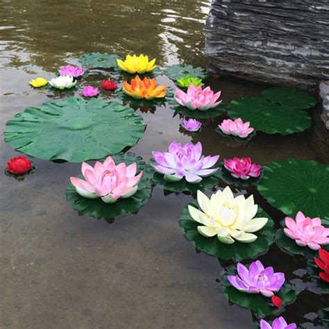 What is floating flower arrangement? 1PCS 10CM Real Touch Artificial Lotus Flower Foam Lotus ...