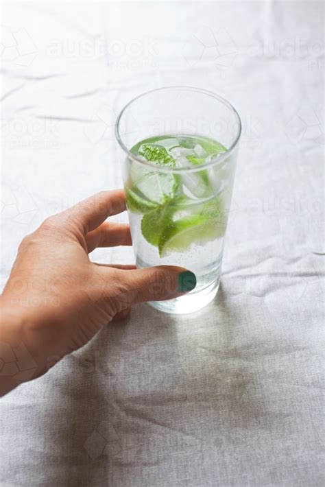 Image Of Cool Glass Of Water With Ice And Mint On Tabletop Austockphoto