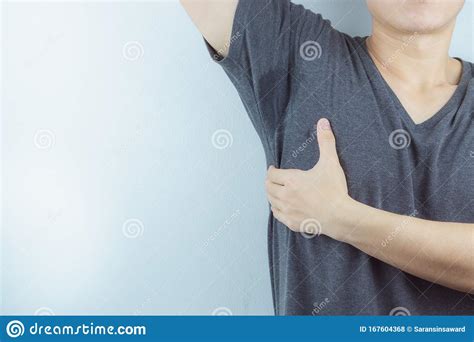 Closeup Man With Hyperhidrosis Sweating Very Badly Under Armpit And