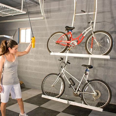 The easy to install hand operated pulley system makes it easy to safely and securely lift your bike off the floor. HugeDomains.com | Bike storage garage, Bike rack garage ...