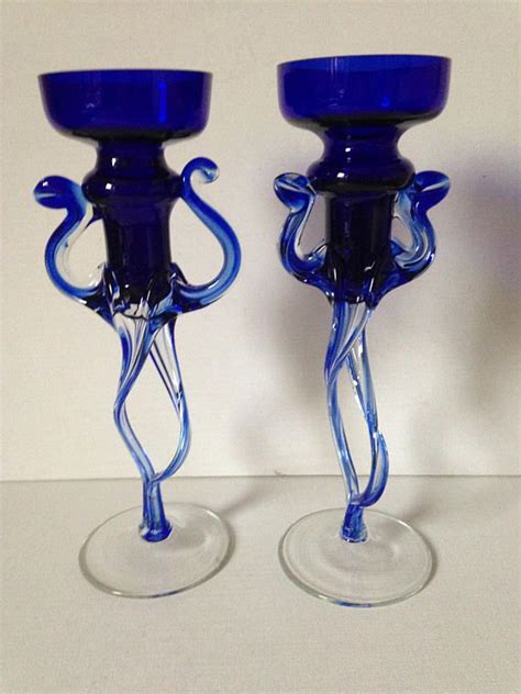 Featuring subtle, yet classic patterns, they're a pretty way to light guests' tables and cast light on your wedding decorations. Blue Candle Holders Votive Candle Holder Cobalt Blue Glass ...
