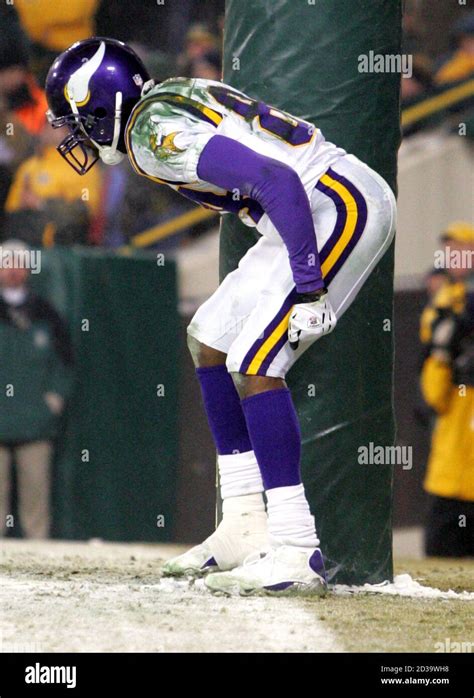 File Photo Of Minnesota Vikings Wide Receiver Randy Moss Pretends To