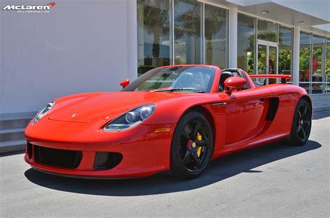 The porsche carrera gt has a basic five colour paint scheme which includes guards red, fayence yellow, basalt black, gt silver and seal grey. Red Carrera GT @MCLARENNB.