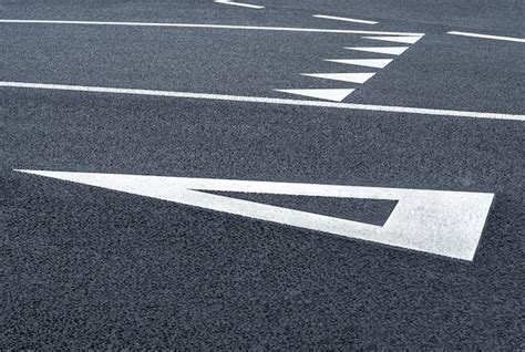 Premium Photo Give Way Triangle Road Markings On The Asphalt Roads
