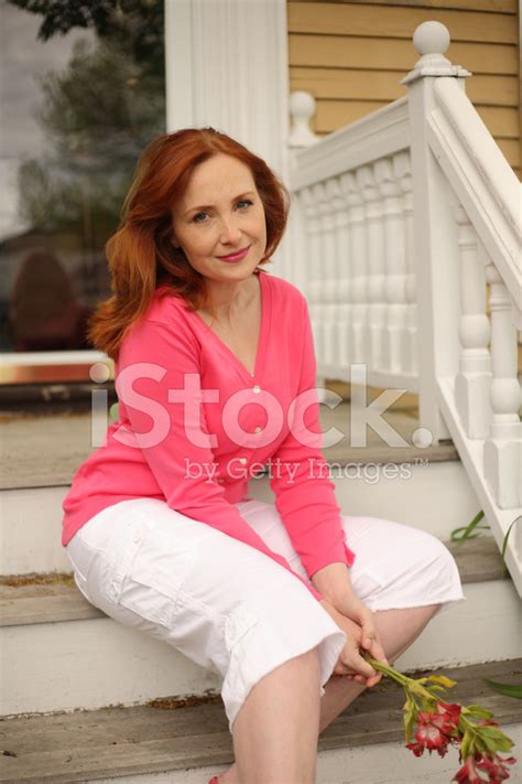 Beautiful Woman Sitting On Front Porch Stock Photo Royalty Free