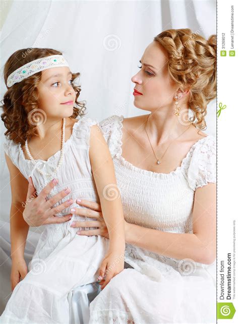 It is made in classical and distinguished style. Mother and daughter stock photo. Image of background ...