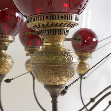 English Victorian Ten Light Chandelier In Brass With Cranberry Glass