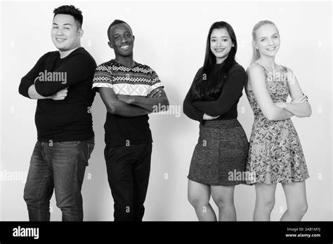 Studio Shot Of Happy Diverse Group Of Multi Ethnic Friends Smiling With