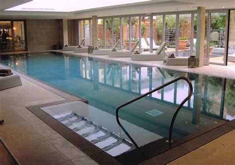 Pool Tile Design Ideas Indoor Pool Design With Modern Chairs Decoration