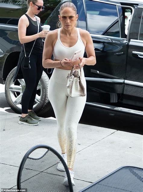 Jennifer Lopez Flaunts Her Iconic Curves While Hitting The Gym In Figure Hugging White Leggings