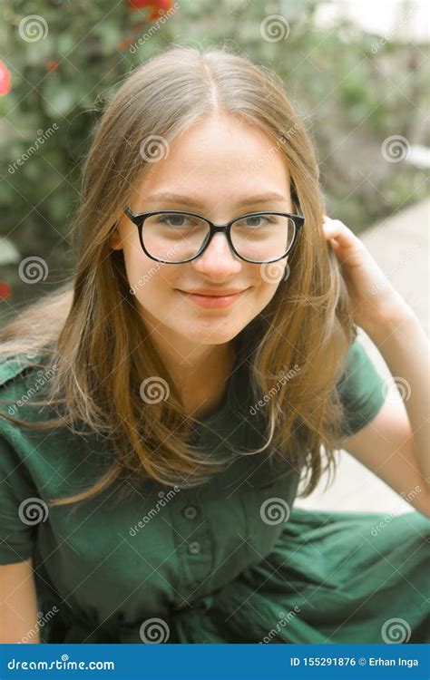 Portrait Of Confident Young Girl With Eyeglasses Smiling Blonde Hair Natural Beautiful Teen